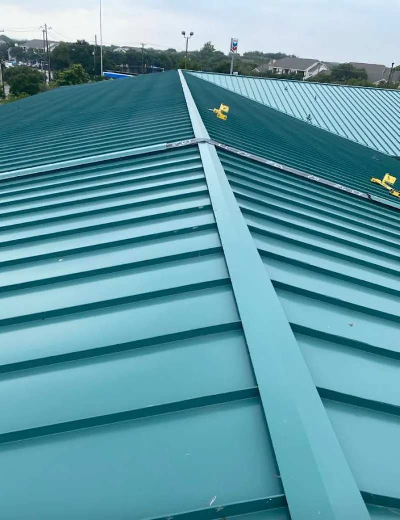 Green commercial metal roof ridge and valley for Metal Roof Repair in Spirit Lake