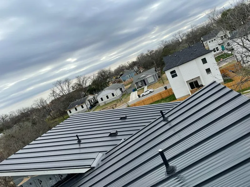 Standing seam metal roof panels with vents for Skylight Repair in Spirit Lake